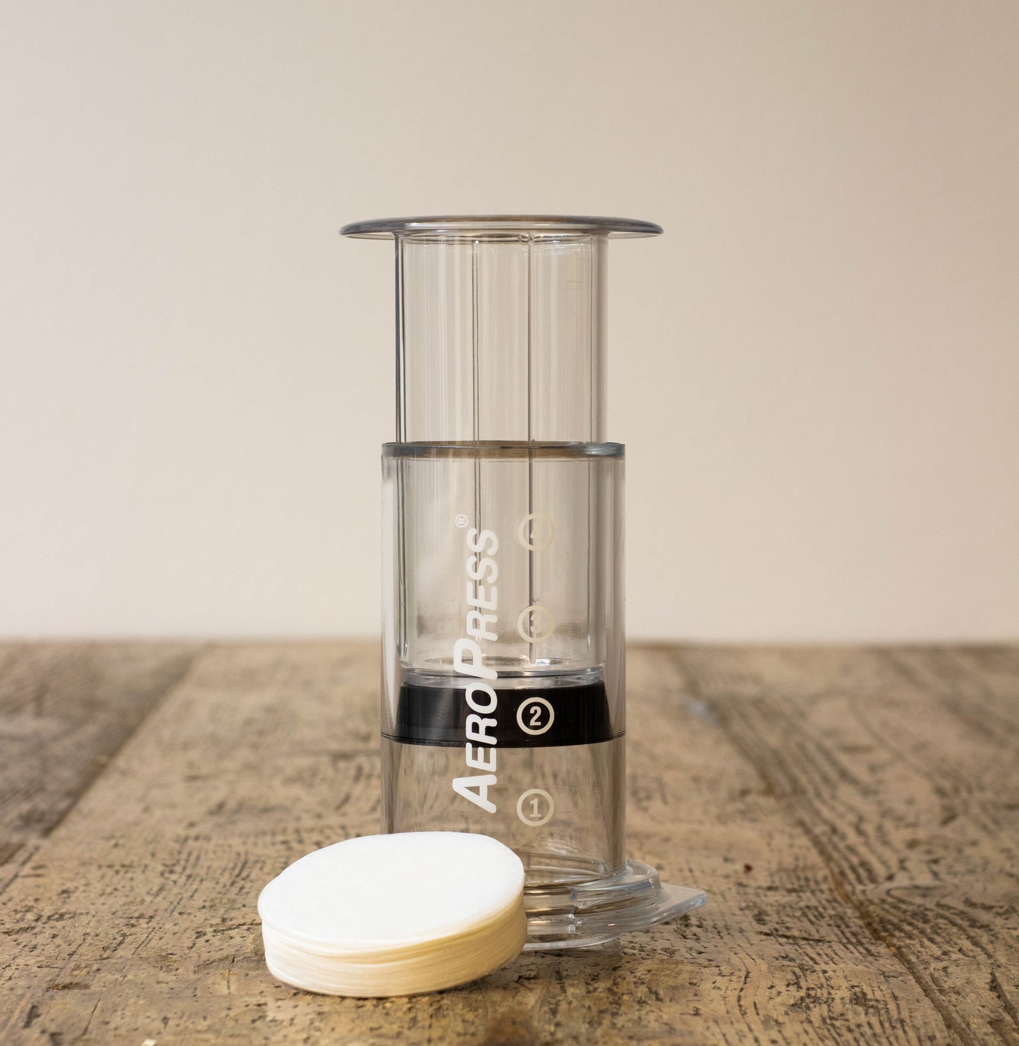 Aeropress clear set, includes filter cap with filter papers within a spoon and a stirrer