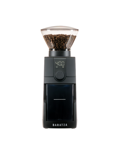 Baratza coffee grinder with digital display and coffee beans on a white background